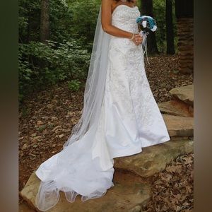 Beautiful strapless beaded wedding gown